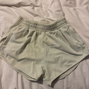 Gymshark pale yellow sweat shorts